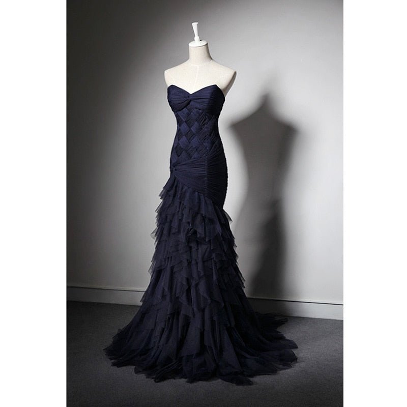 The delicate ruched tulle party and bridal dress