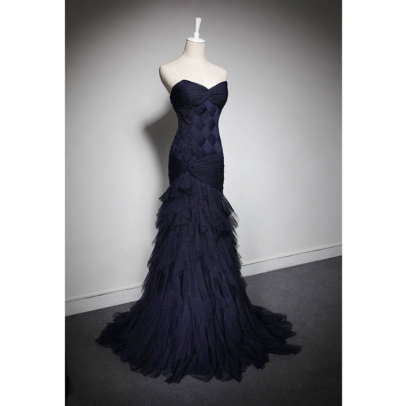 The delicate ruched tulle party and bridal dress
