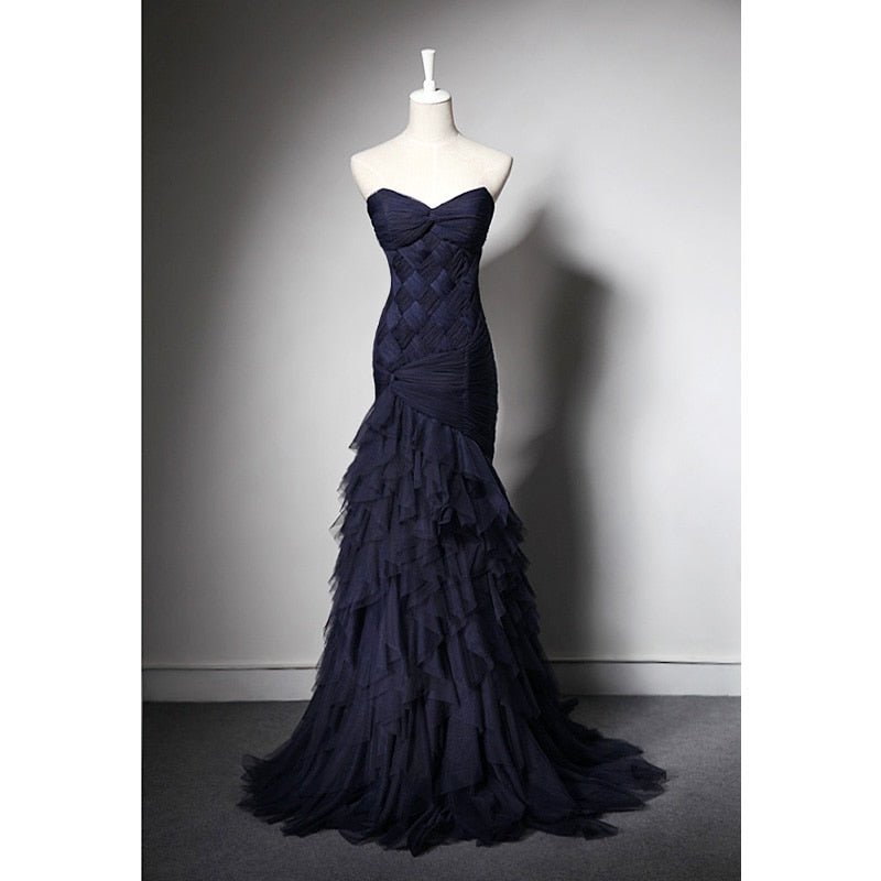 The delicate ruched tulle party and bridal dress
