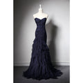 The delicate ruched tulle party and bridal dress