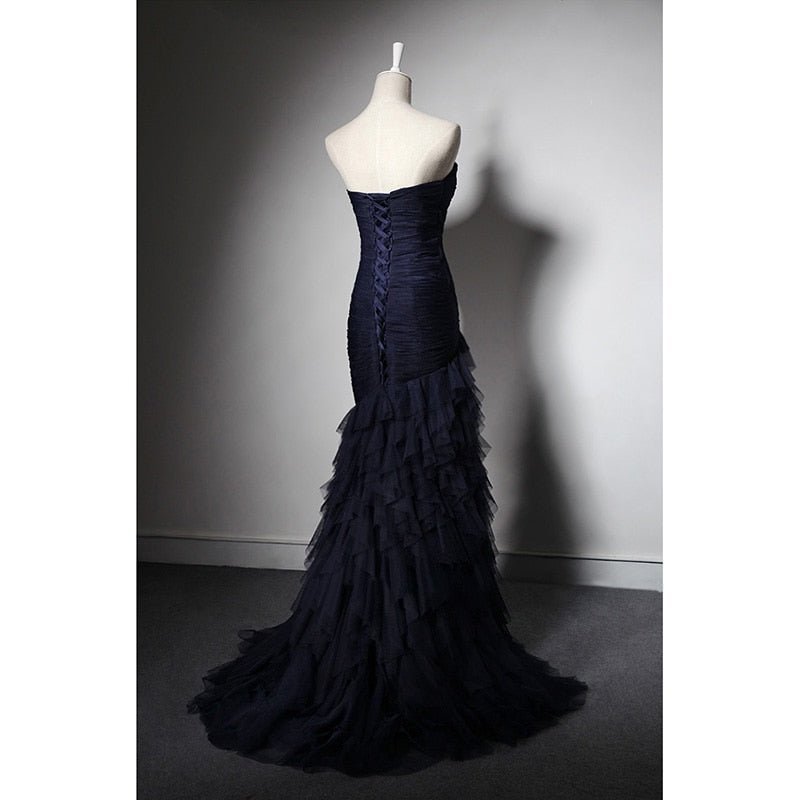The delicate ruched tulle party and bridal dress